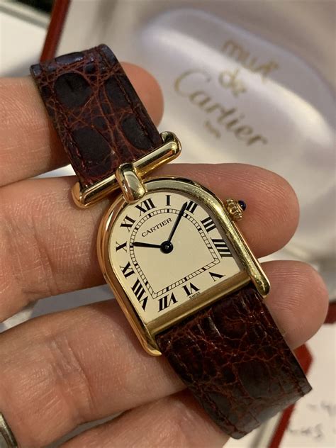 cartier stirrup watch.